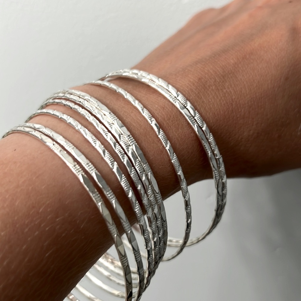 Set of 9 metal bangle bracelets